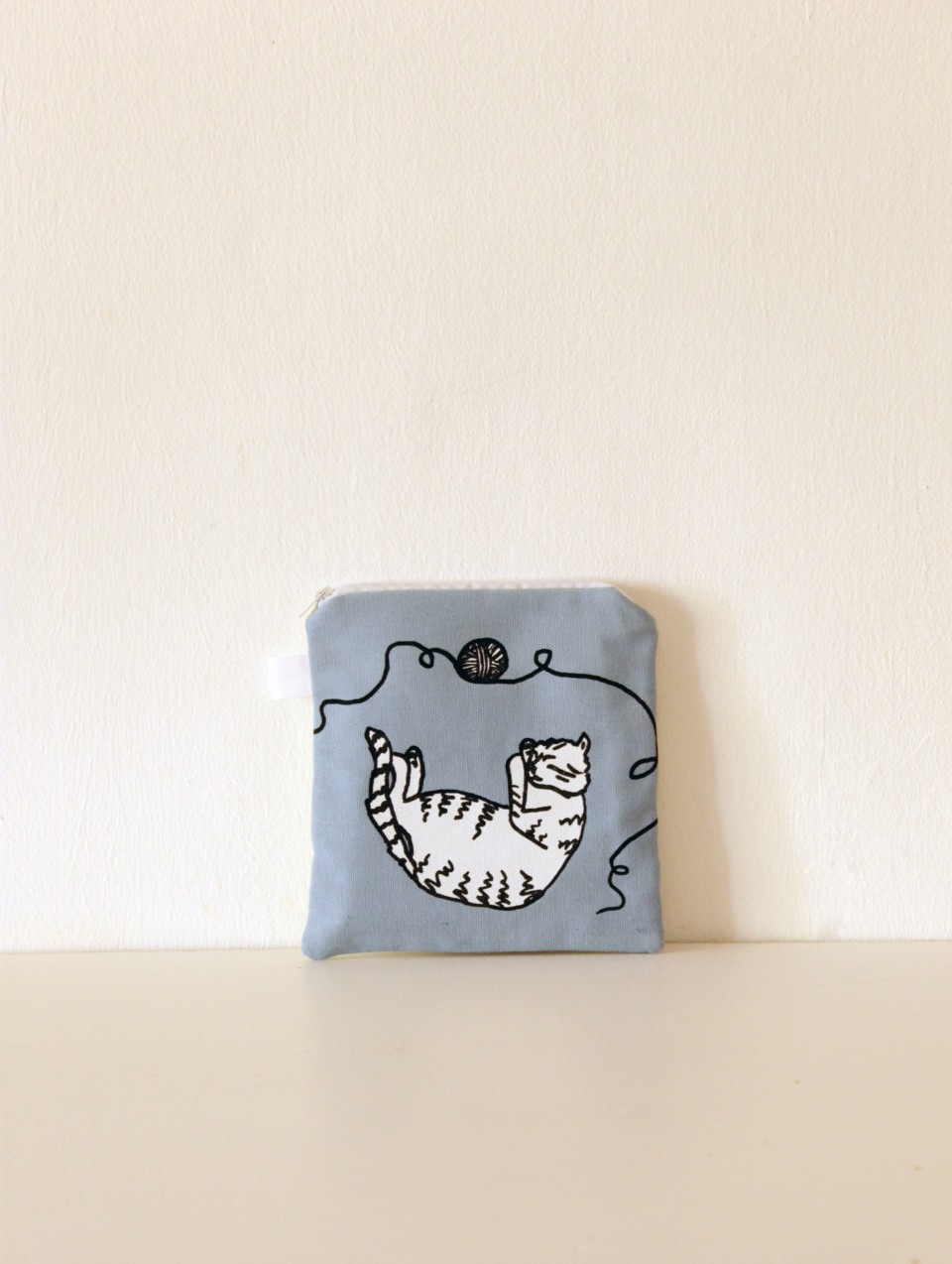 Small light blue pouch